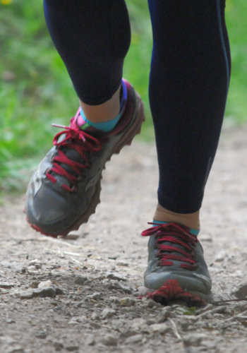 close up photo of a runners feet