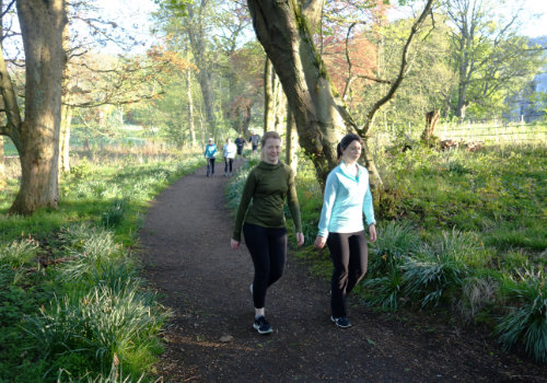 photo of a group of runners taking a walking break