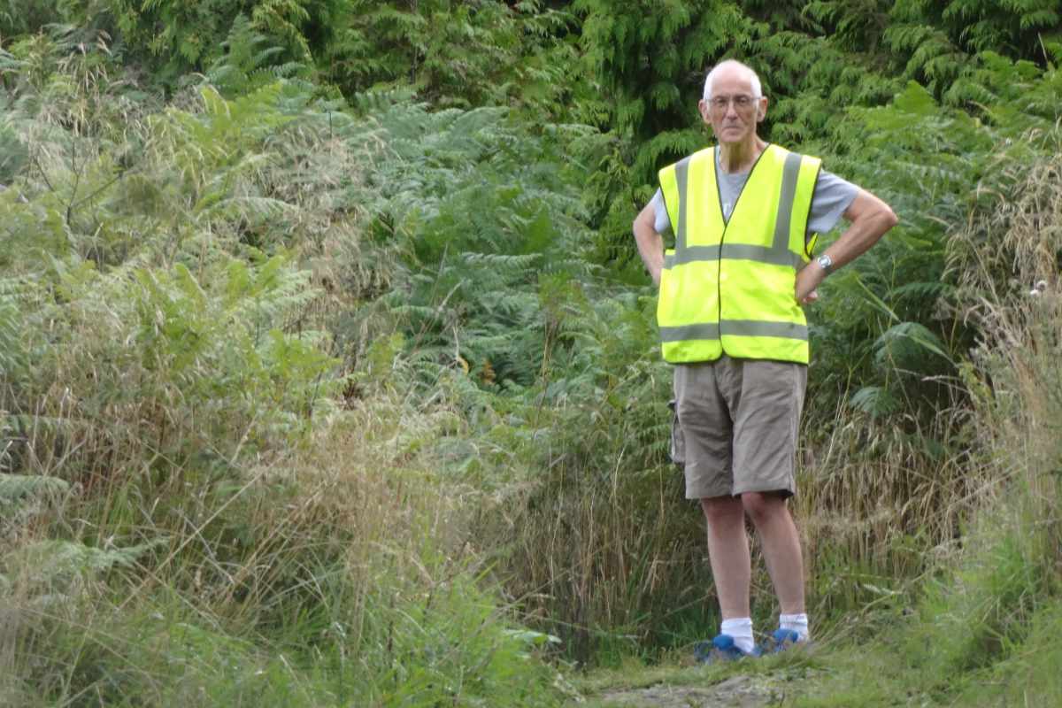 photo of an event marshal in high visibility jacket.