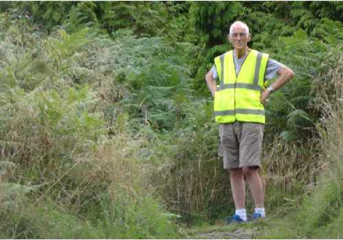 photo of an event marshal in high visibility jacket.